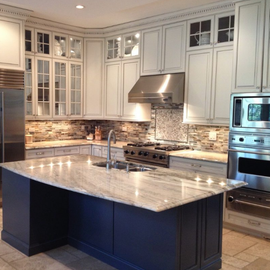 beautiful countertops and tile backsplash