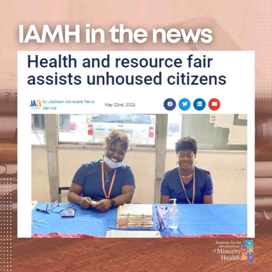 Two women sit at a table at a health fair. Text above reads