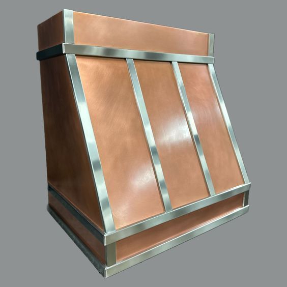 Copper and brushed-metal decorative wall hood with angled panels