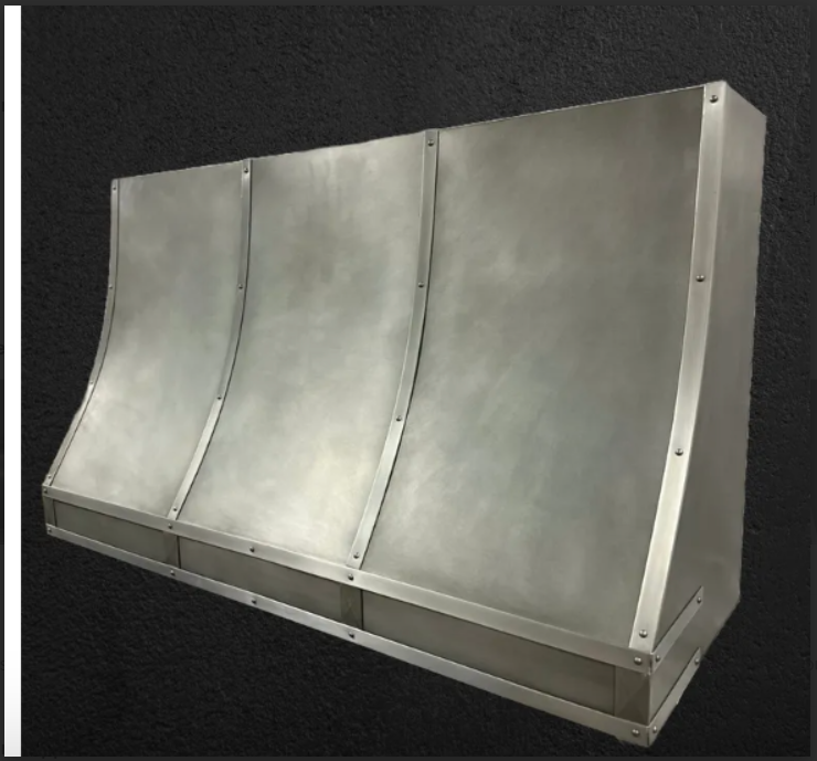 Curved stainless steel industrial panel with a brushed finish on a dark background