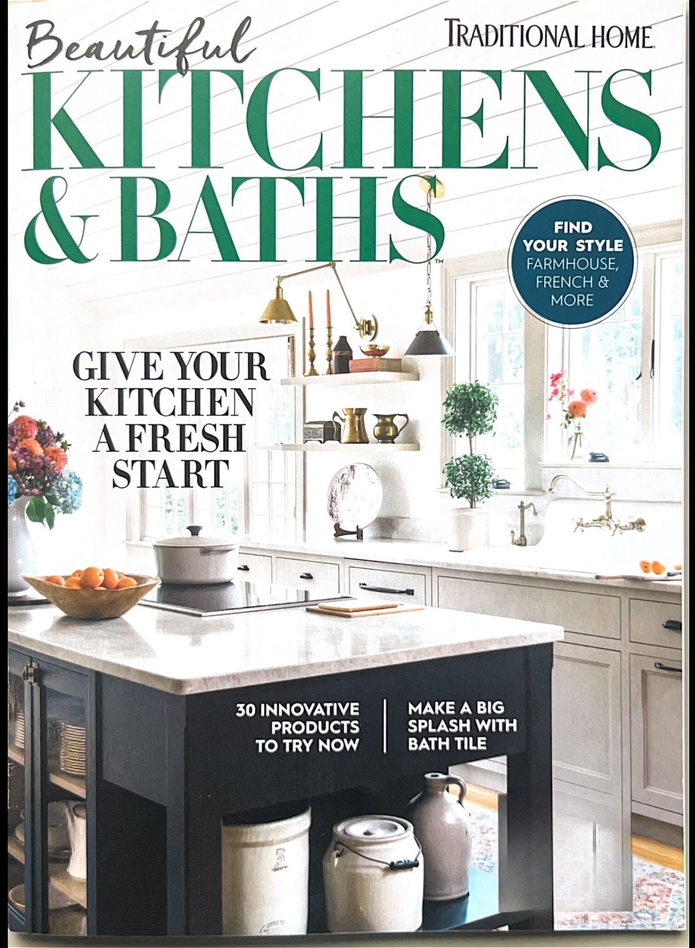 Magazine cover for Beautiful Kitchens & Baths featuring a bright white kitchen with an island and text headlines