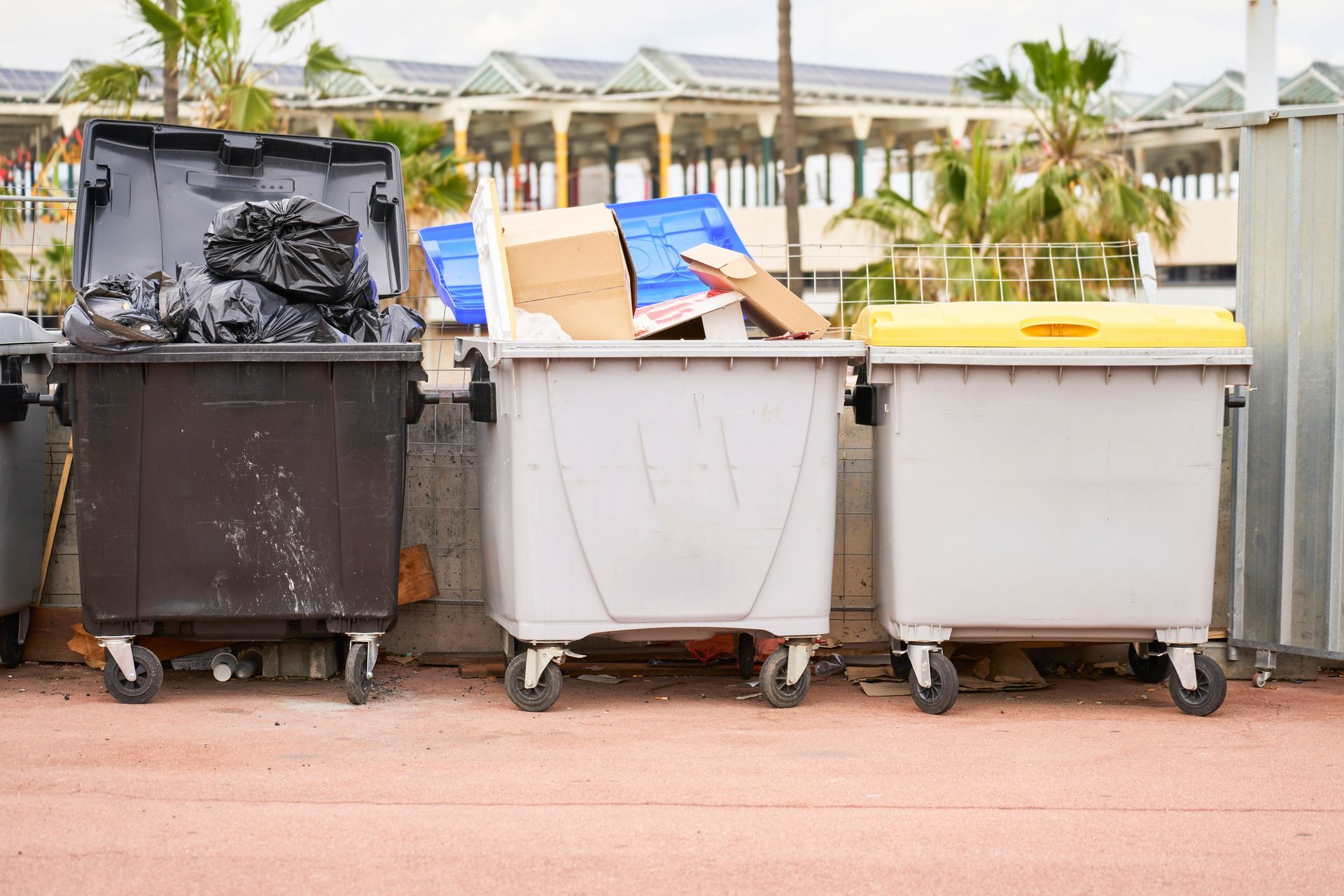 Recycling waste container separating recyclable materials from their waste.
