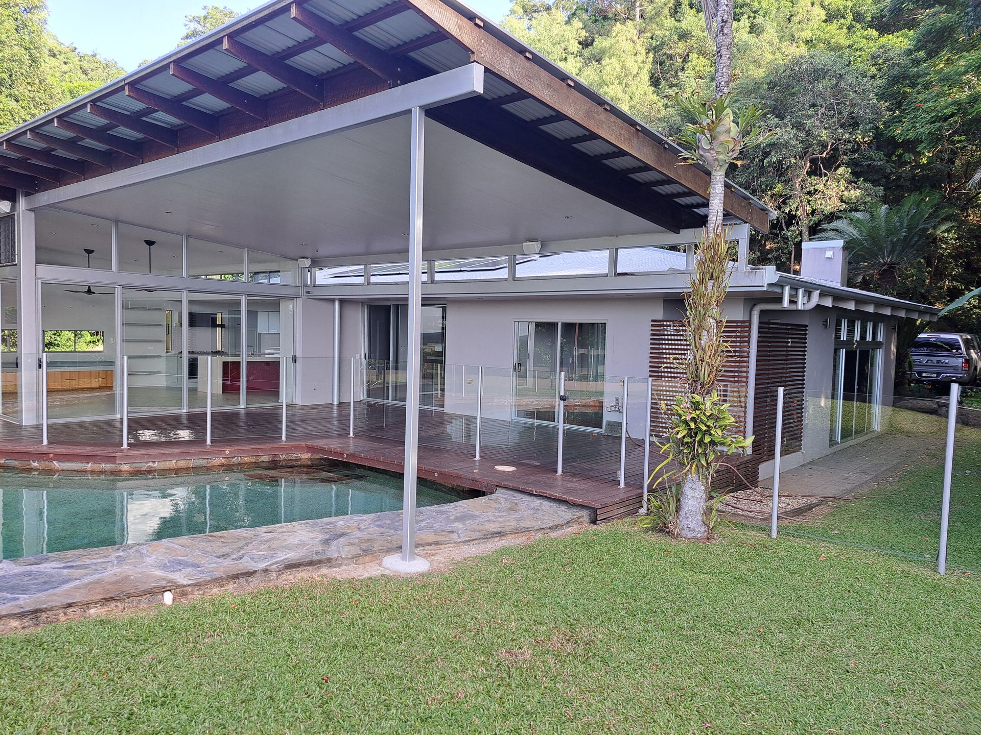Modern Building With Red, Gray, and White Exterior — AB QUICK Painting & Maintenance Services In Mareeba, QLD