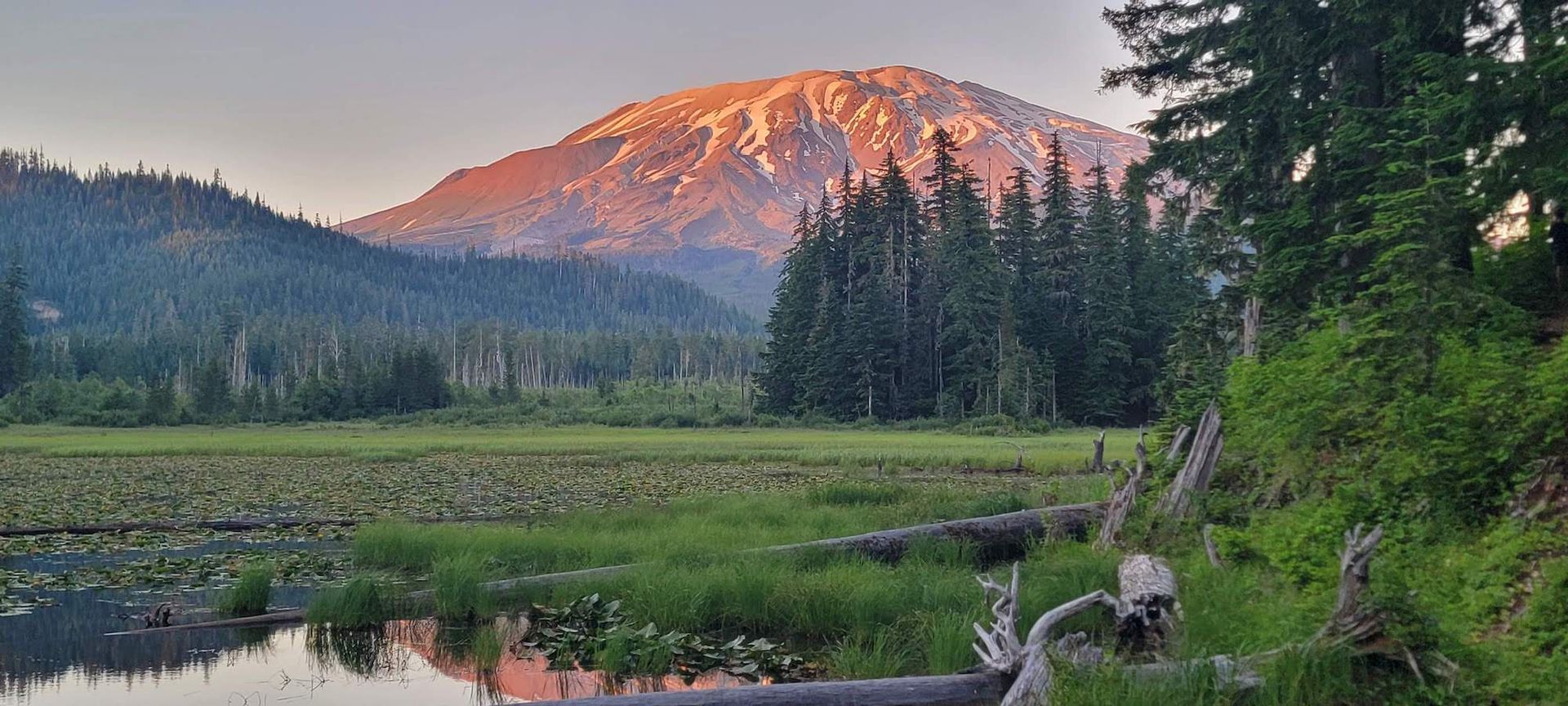 We preach Christ and Him crucified. I Corinthians 2:2 (background picture of a marsh with a mountain behind it)