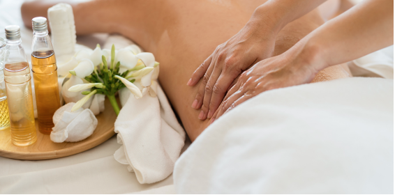 A woman is getting a massage at a spa.