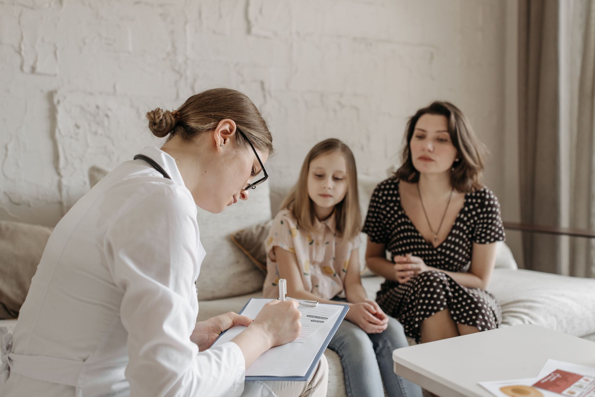 Pediatrician talking to a parent