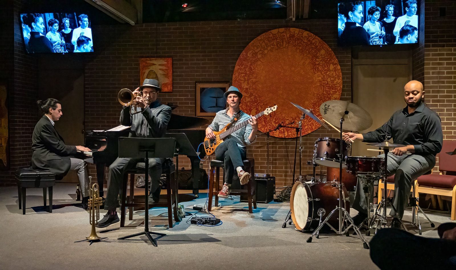 A group of men are playing instruments