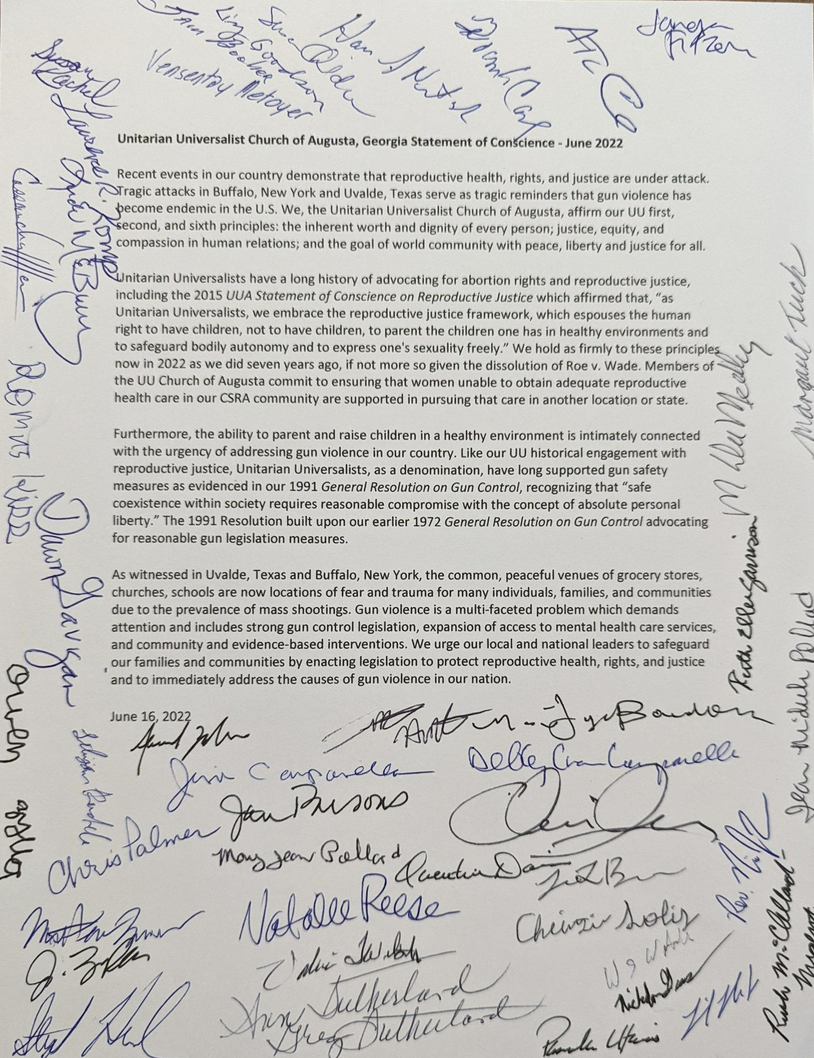 A piece of paper with a lot of signatures on it