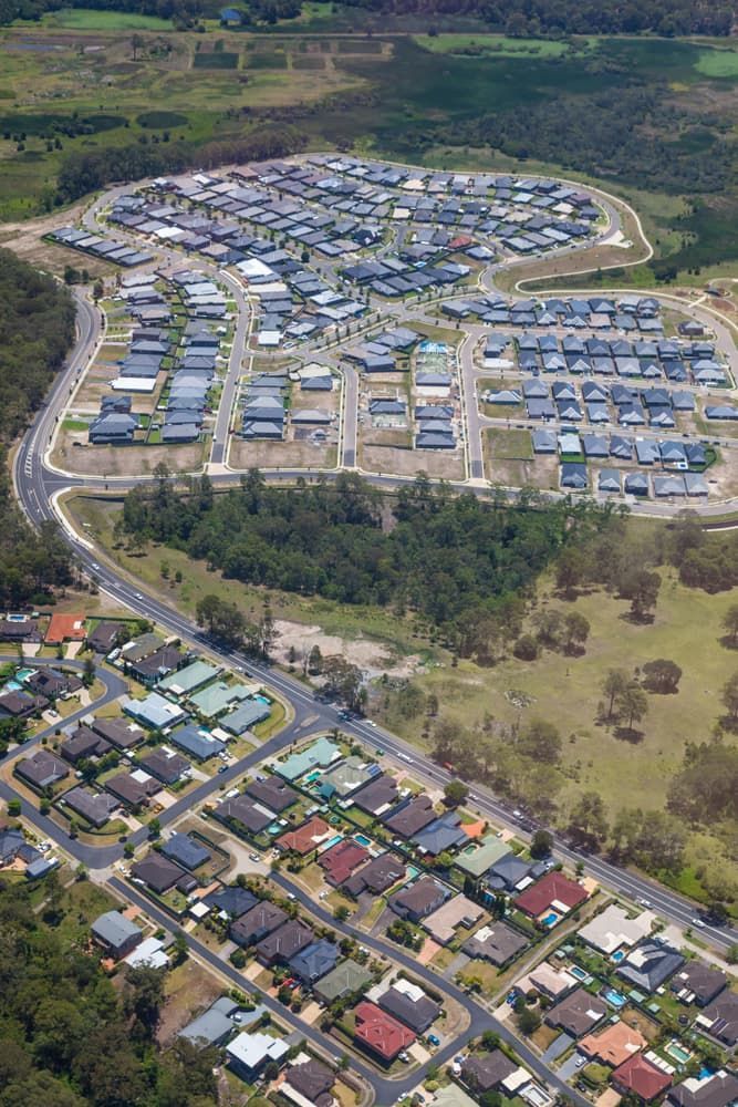 An Aerial View of A Residential Area with Lots of Houses and Trees — Twin Lakes Towing & Recovery in New Lambton, NSW