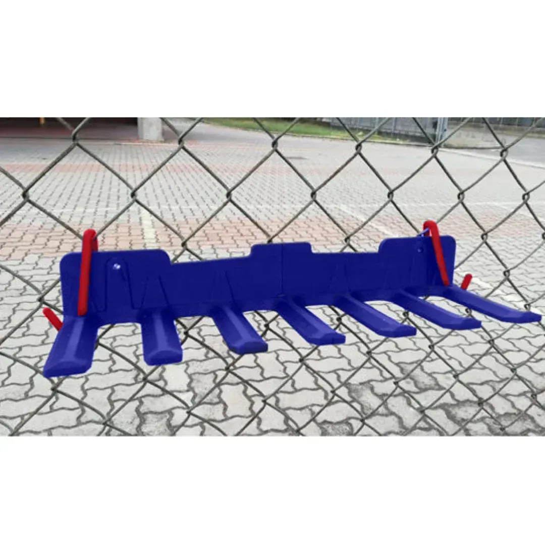 A blue tool rack is attached to a chain link fence