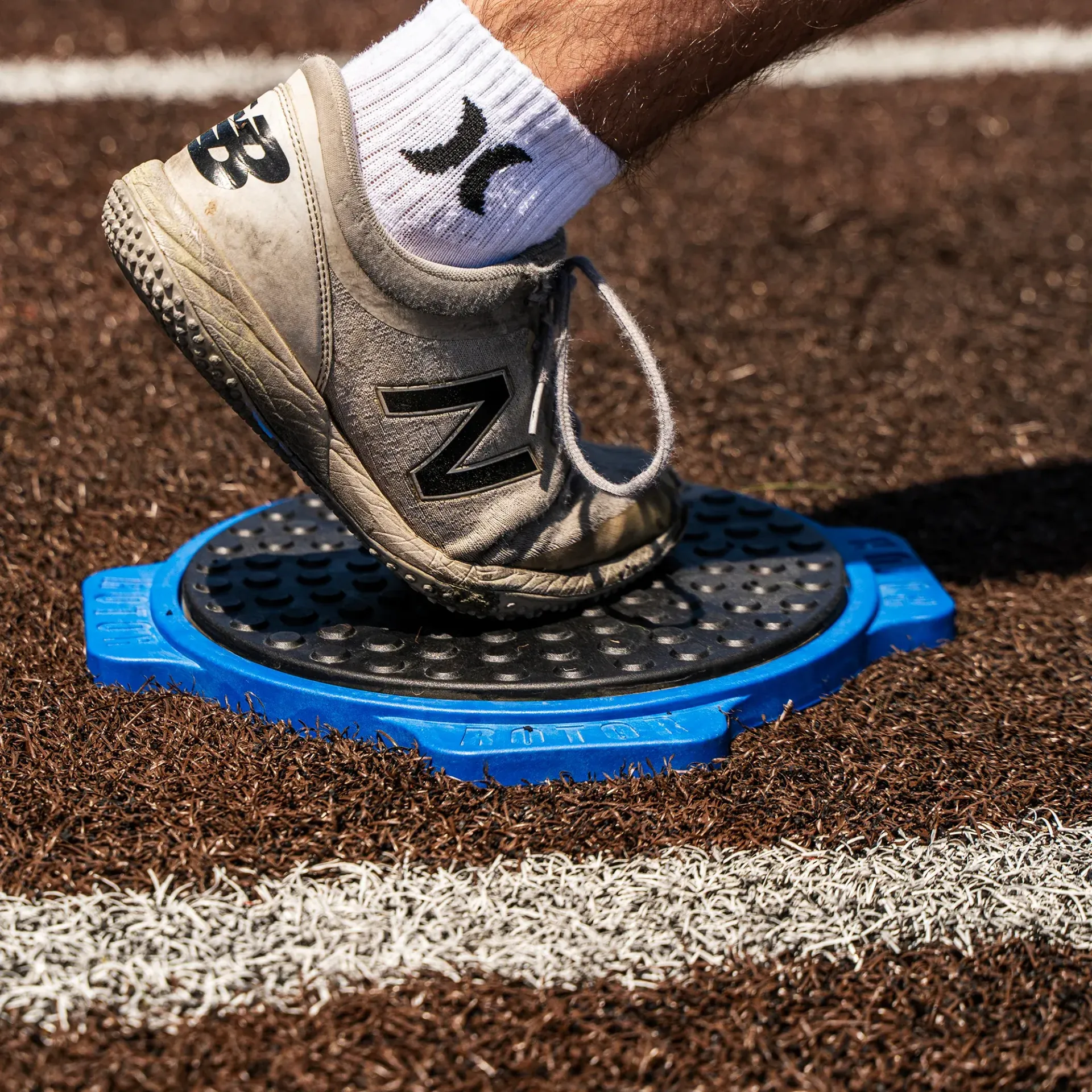 A person wearing a pair of new balance shoes