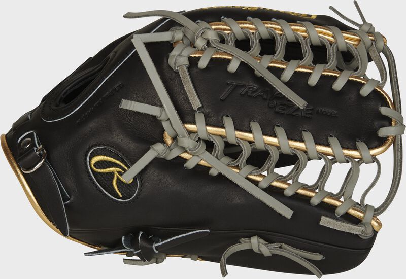 A black and gold baseball glove with gray laces