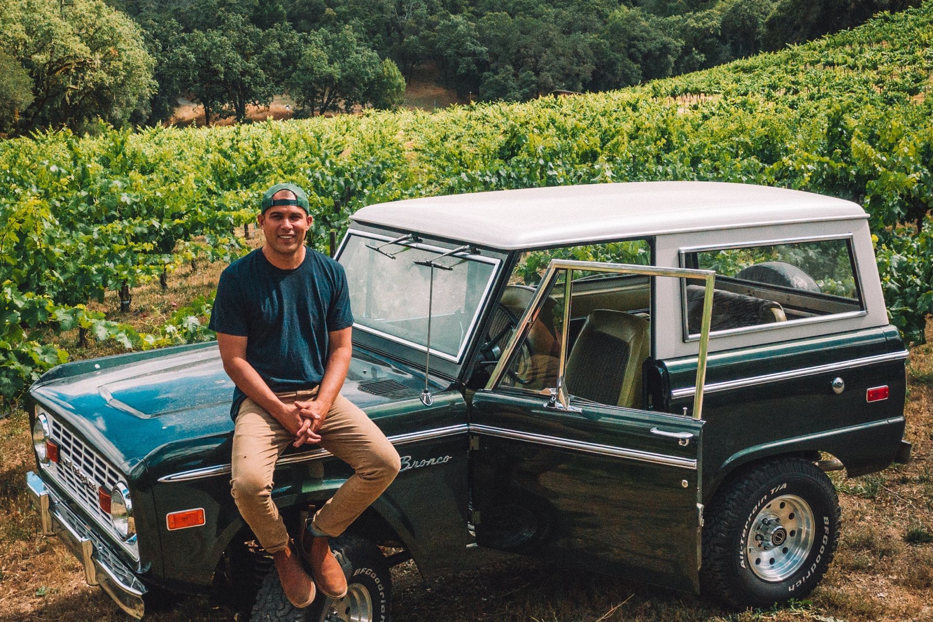 Josh Phelps sitting atop his Ford Bronco in the vineyard Josh Phelps sitting atop his Ford Bronco in the vineyard
