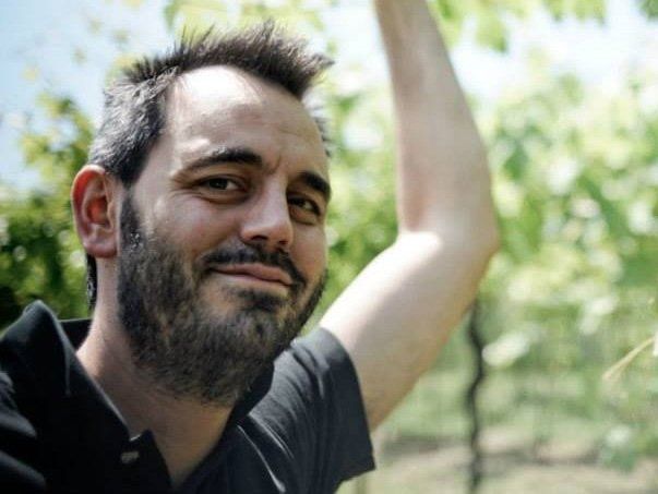 Stefano Menti, winemaker of Marco Barba, outdoors.