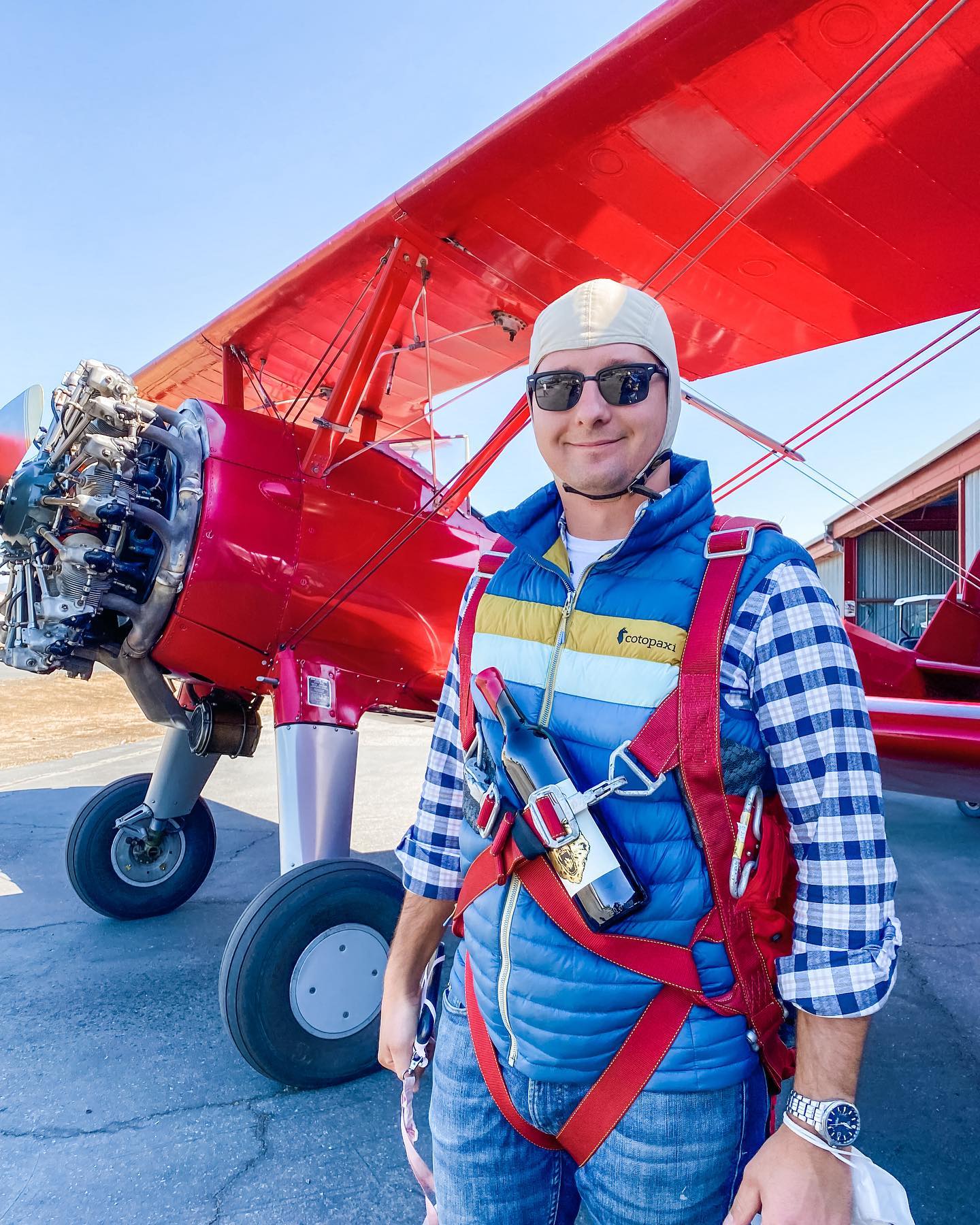 Robert Pintasci of St. Romedius, amateur pilot, pictured beside a vintage aircraft before flight.