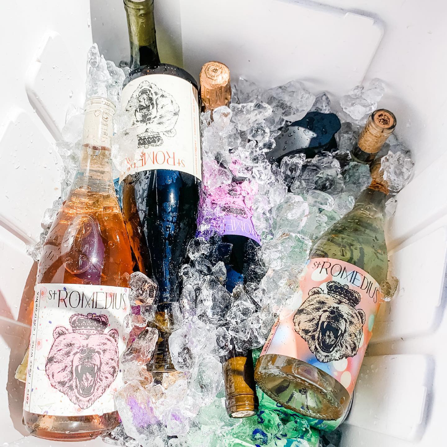 St. Romedius wines chilled on ice, showcasing the estate’s bottled range ready to serve.