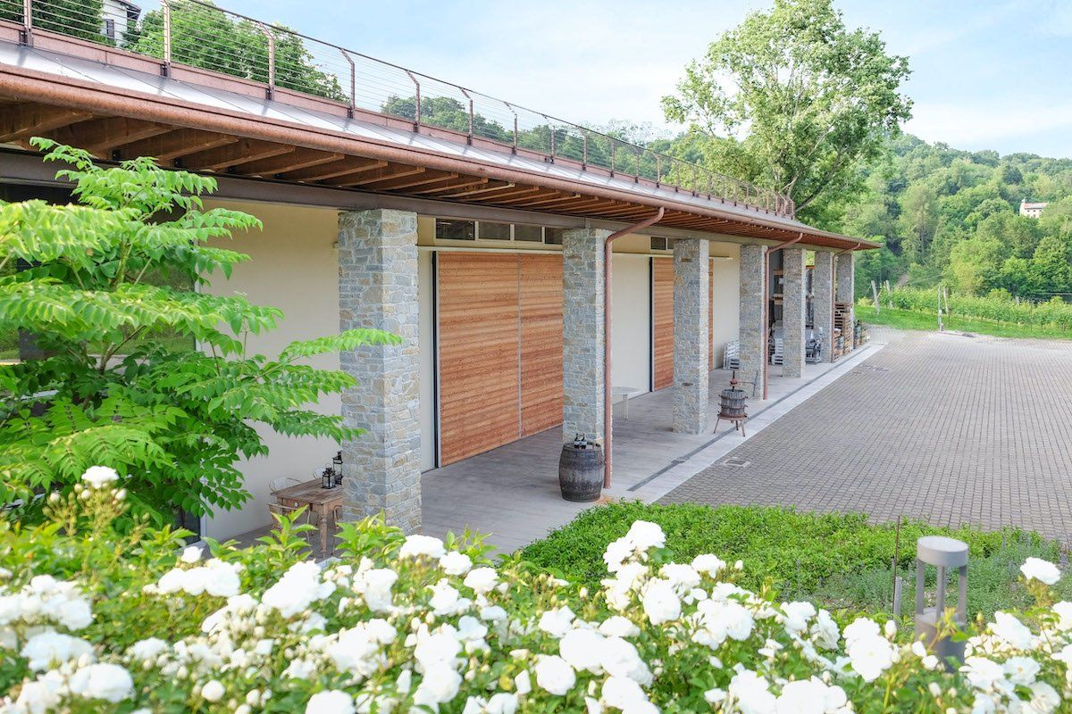 Stone and wood winery building at Tenuta Amadio