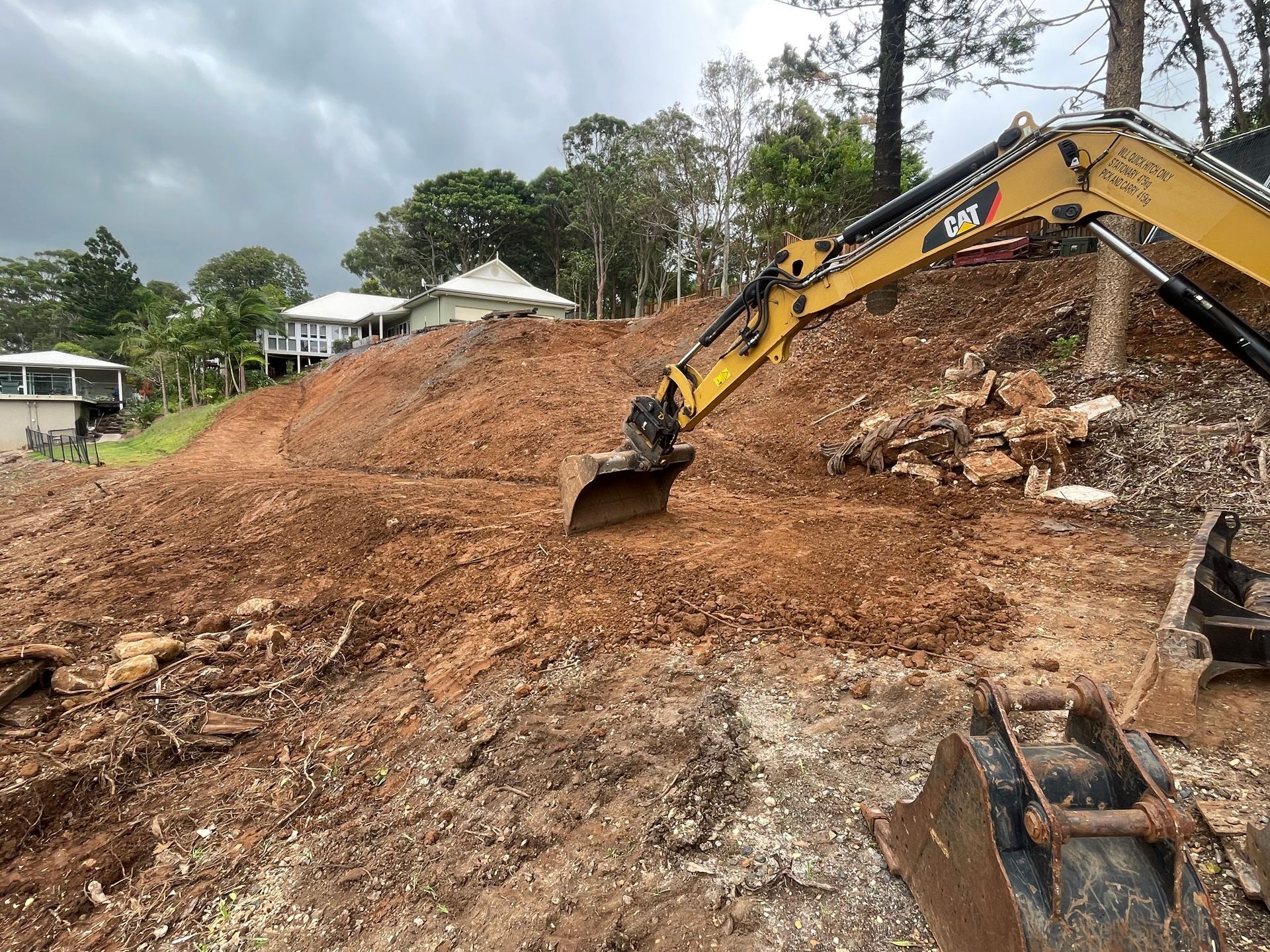 An Excavator Is Moving Dirt — East Point Earthmoving in Byron Bay, NSW