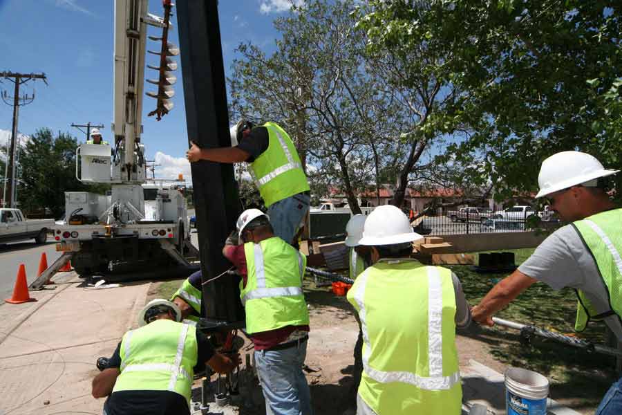Workers Installing Traffic Light — Las Cruces, NM — RT Electric