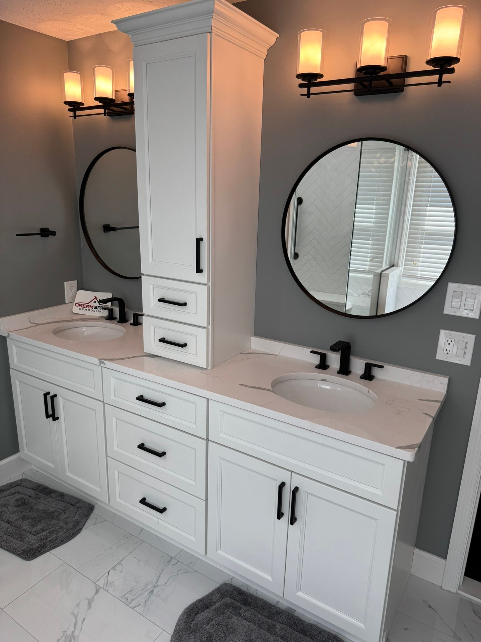 Columbia, MD modern master bathroom with oversized shower tiles, double vanity, and freestanding tub