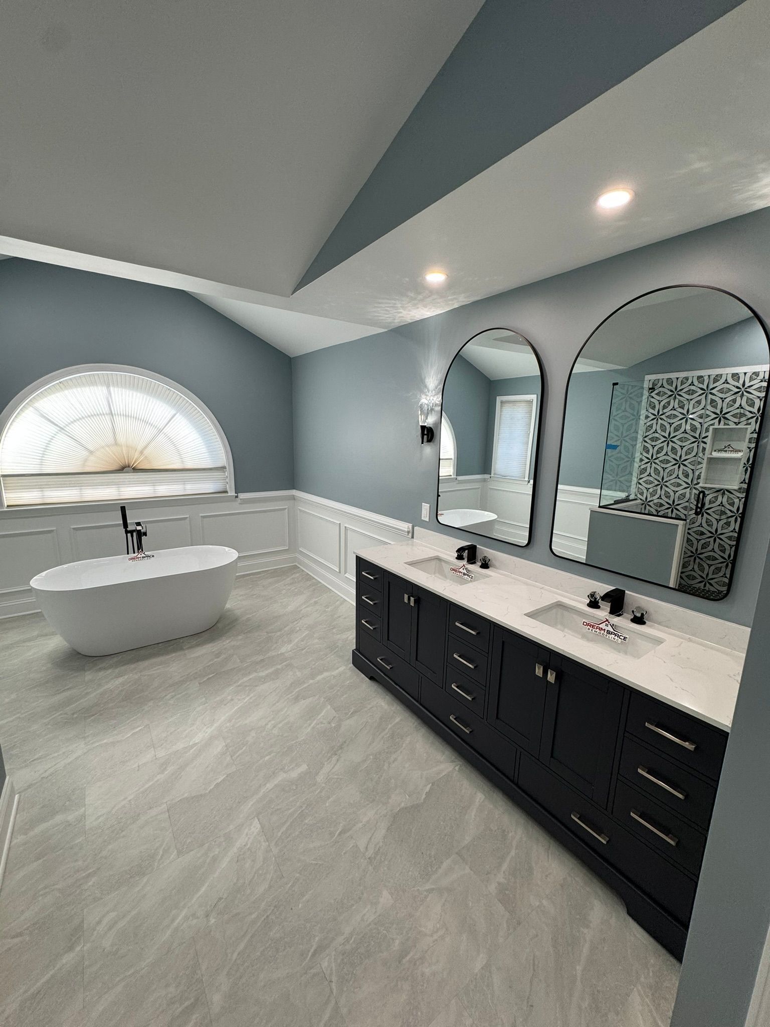Modern master bathroom remodel in Perry Hall, MD with double 84-inch vanity, freestanding tub, and large walk-in glass shower