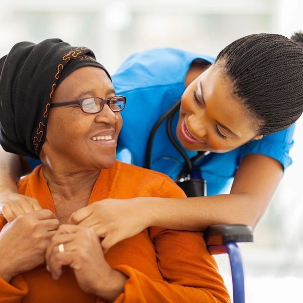 Carer helping client