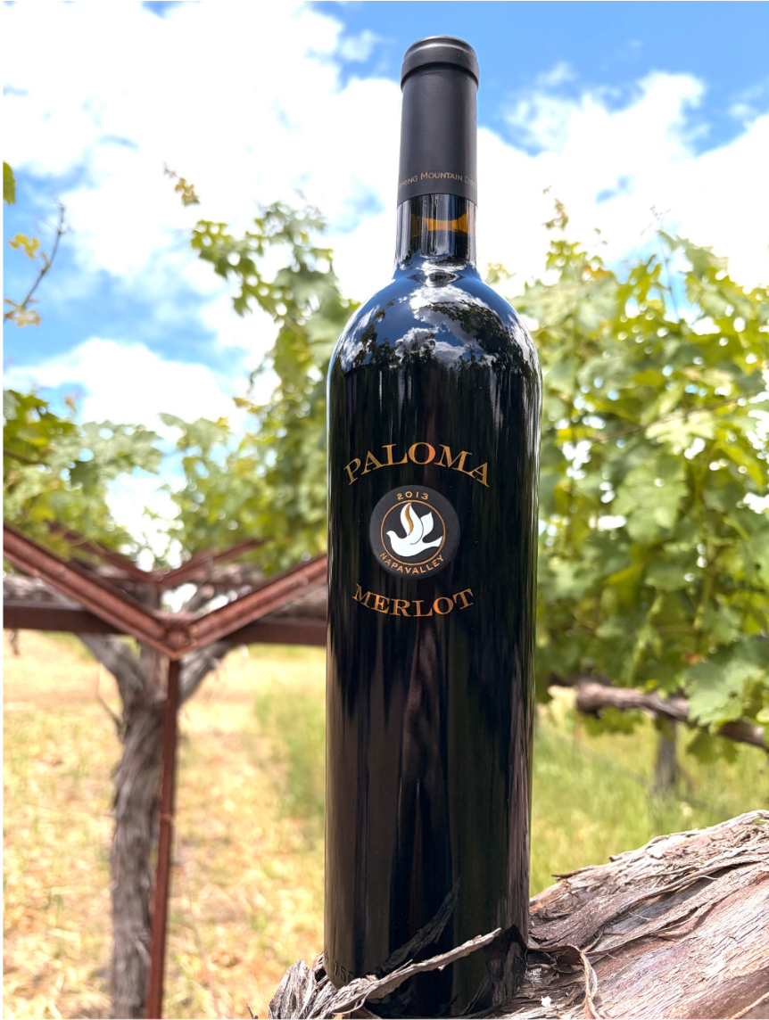 Paloma Merlot bottle from Spring Mountain Napa Valley, a structured red wine ideal for aging at home.