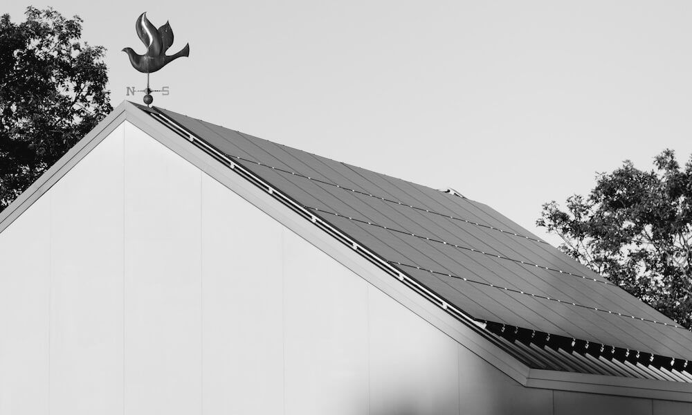 Solar panels on a sloped roof at Paloma Vineyard farm, supporting the estate's sustainability efforts on Spring Mountain.