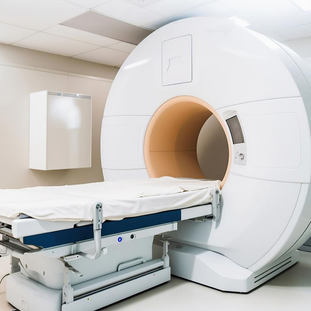 CT scanner in a modern hospital imaging room with an examination table.