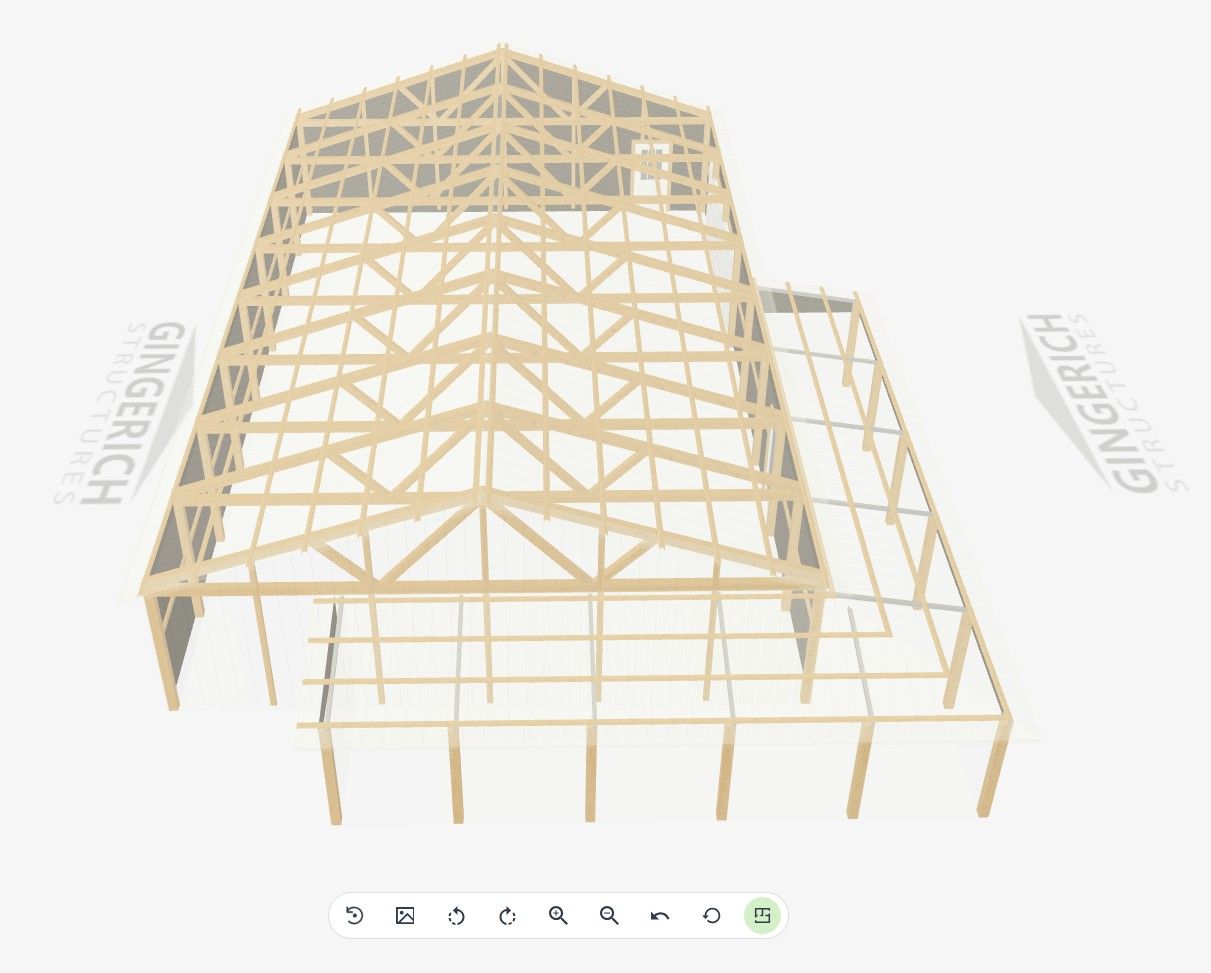 Wooden building frame with exposed trusses and beams, angled view.