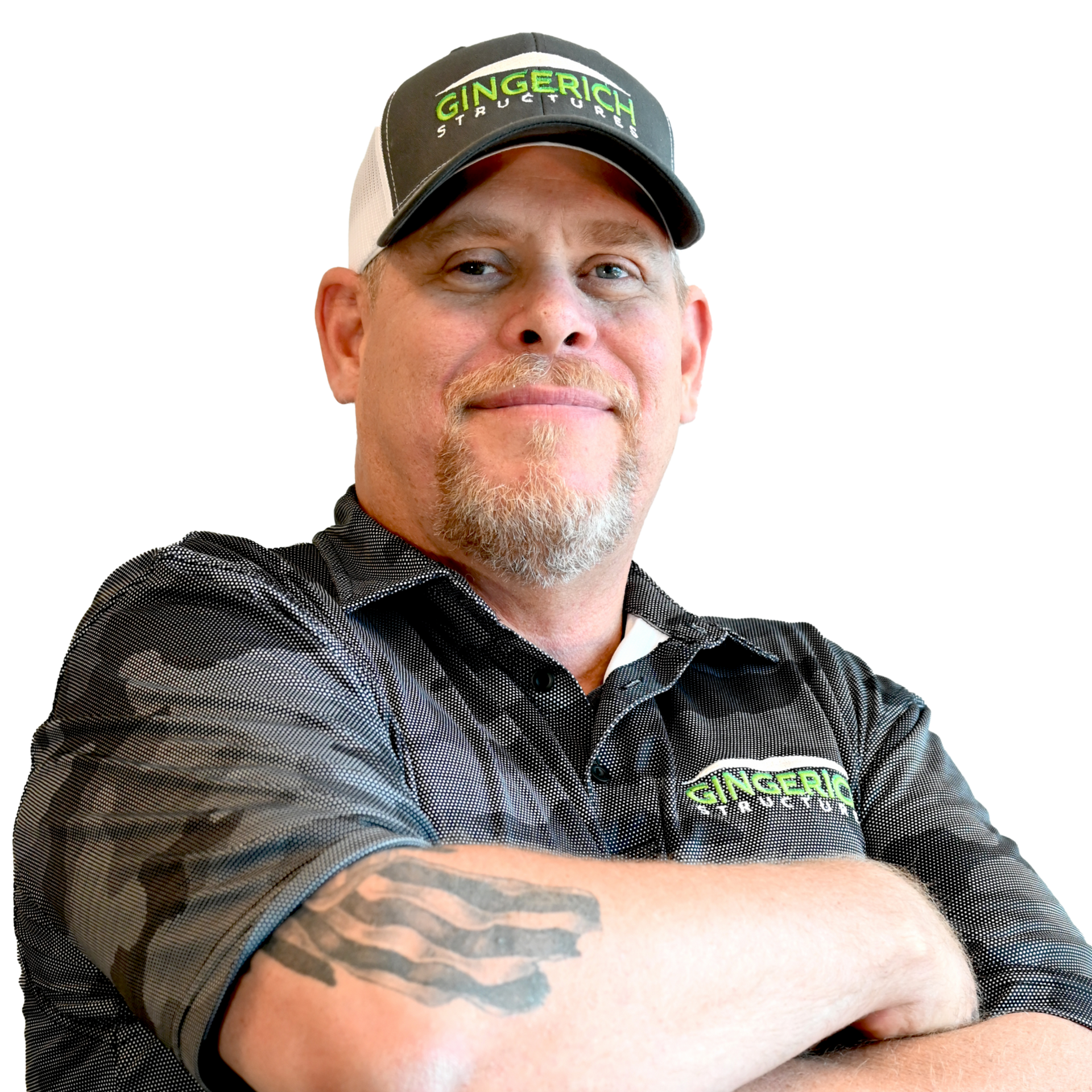 Man with beard and tattoo wearing a hat with