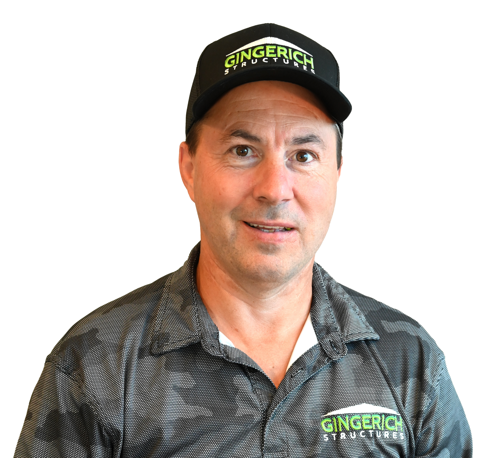 Man wearing a black hat and patterned shirt, smiling, with a Gingerich Structures logo visible.