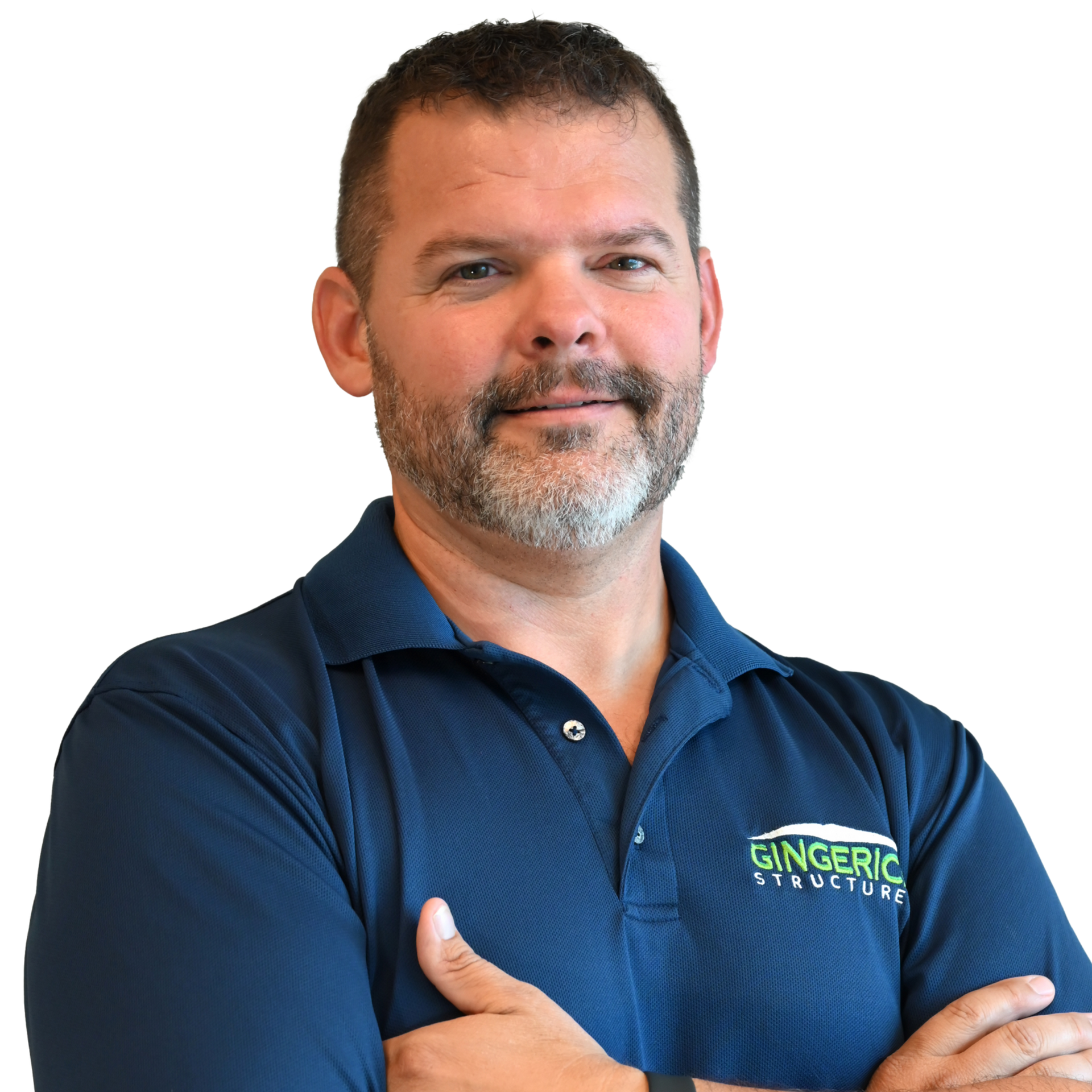 Man in blue polo shirt, arms crossed, smiling. Logo: