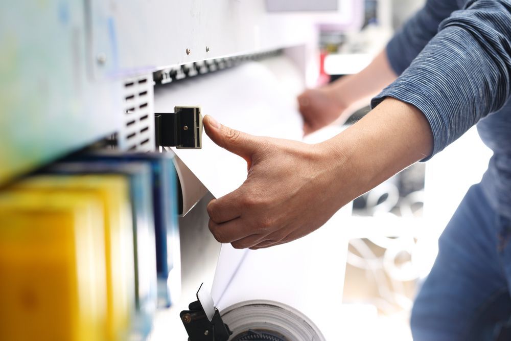 Hand Reaching to Choose a Product Box on a Store Shelf — Lehmann Print Solutions in Proserpine, QLD
