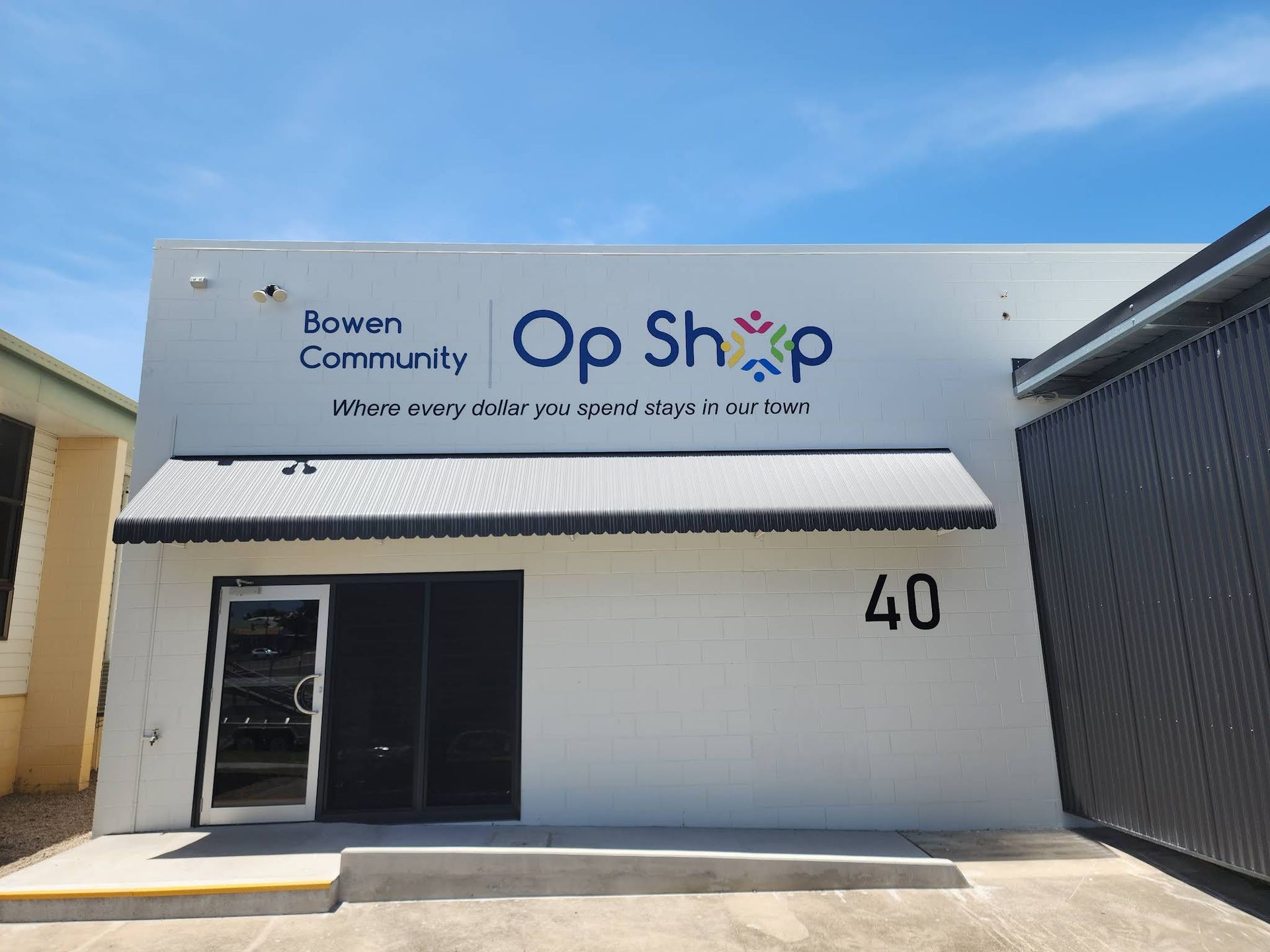 Exterior of Brown Community Op Shop Storefront — Lehmann Print Solutions in Proserpine, QLD