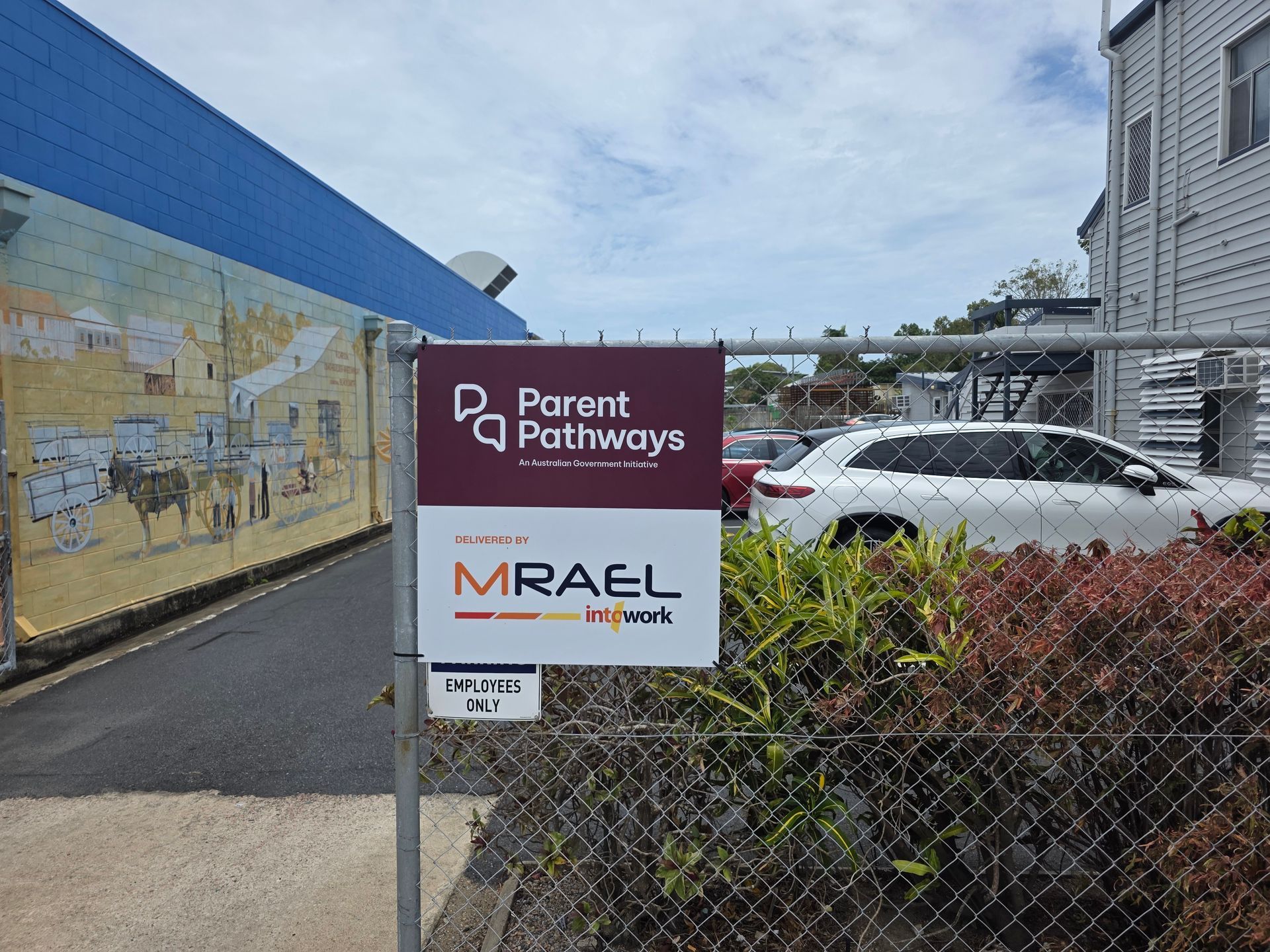 Signs for Parent Pathways and Mrael Beside a Chain-link Fence — Lehmann Print Solutions in Bowen, QLD