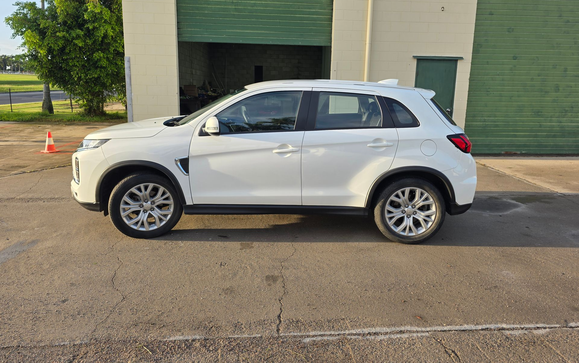 White SUV parked — Lehmann Print Solutions in Bowen, QLD