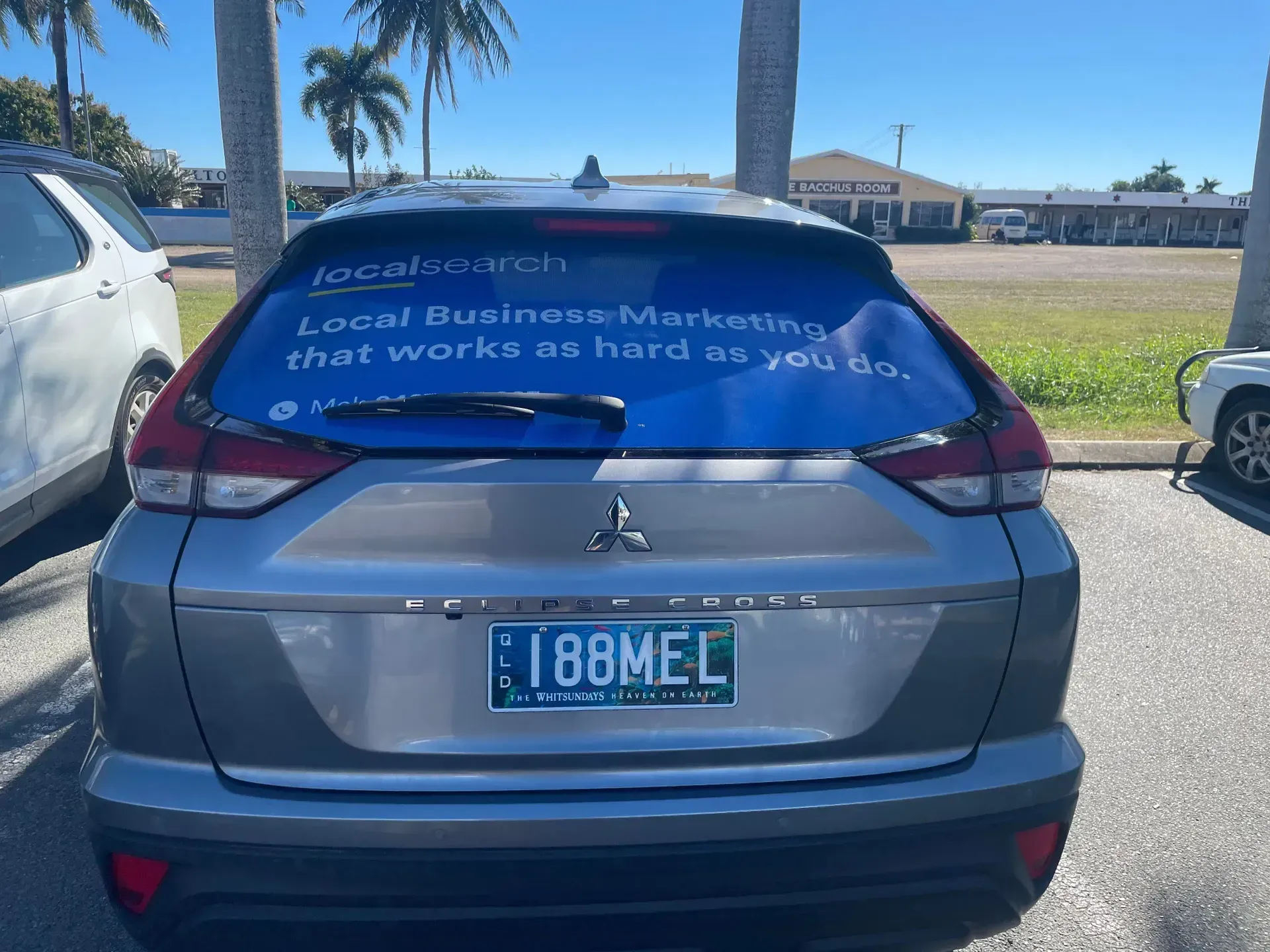 Rear View of a Gray Mitsubishi SUV — Lehmann Print Solutions in Bowen, QLD