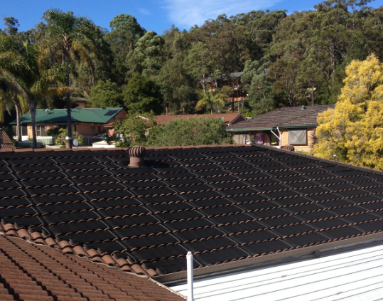 A Roof With a Lot of Solar Panels on It — Newcastle Solar Pool Heating Systems In Port Stephens, NSW