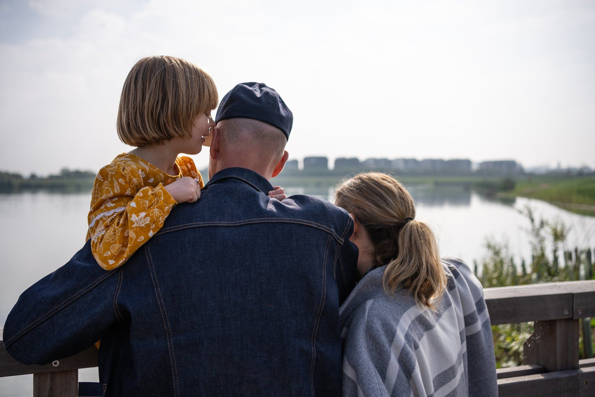 family at lake
