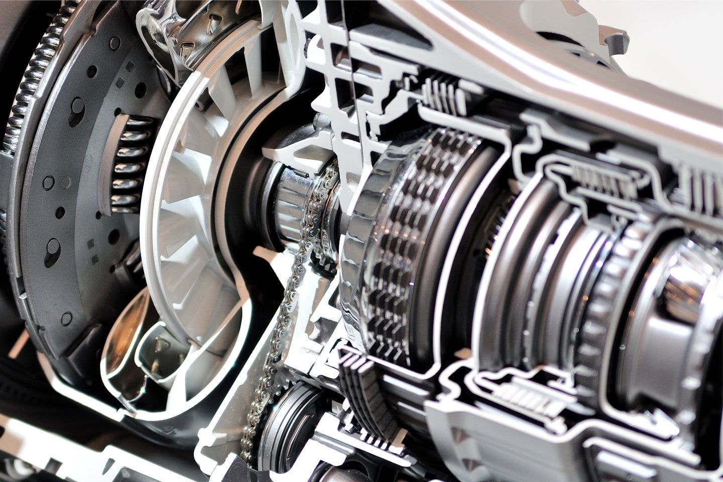 Close-up of a jet engine turbine with metallic blades and internal mechanical components