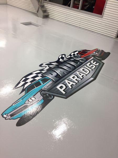Floor decal of a classic car, checkered flag, and 