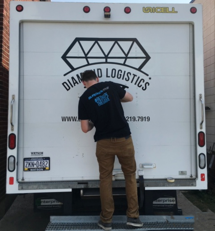 Man working on the back of a 