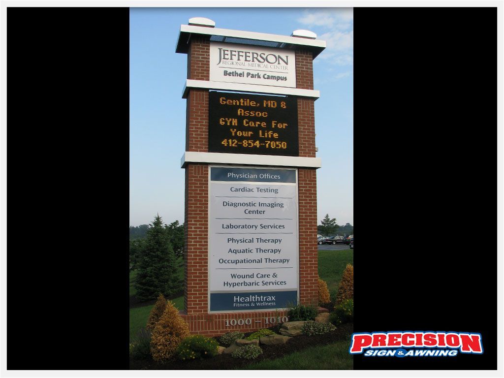 Sign for Jefferson Orthopedic & Sports Medicine with tenants listed on a brick pillar, 410-654-7150.