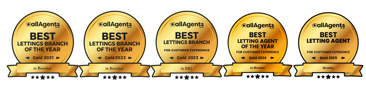 Four gold plaques that say best lettings branch of the year