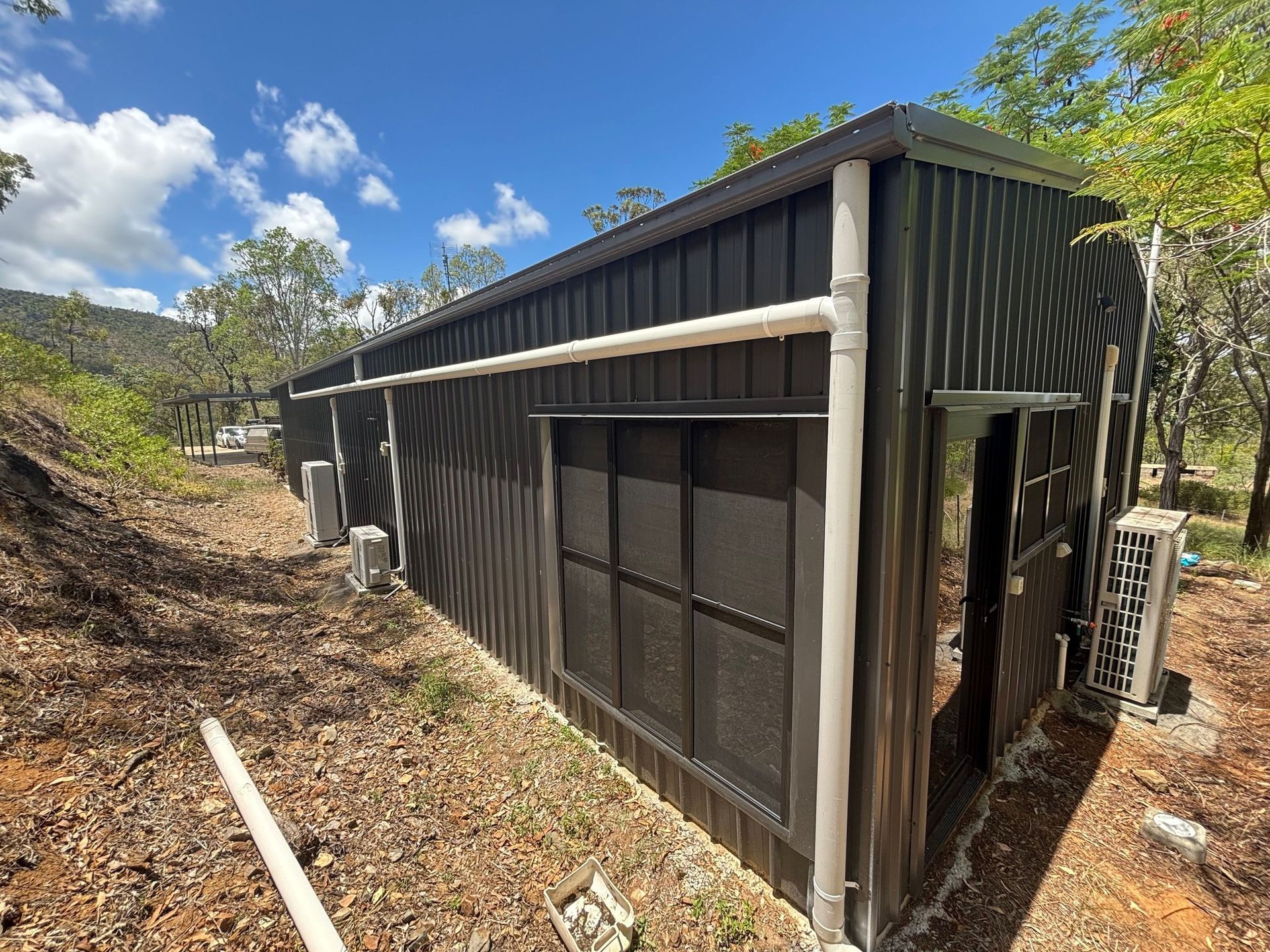 Outdoor Sinks in a Public Restroom — Gibson Plumbing & Roofing Pty Ltd in Gladstone Central, QLD