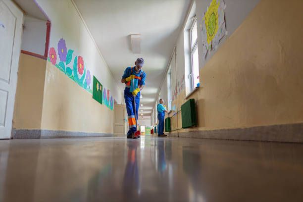 Man Cleaning the Floor — Champaign, IL — Precision Maintenance