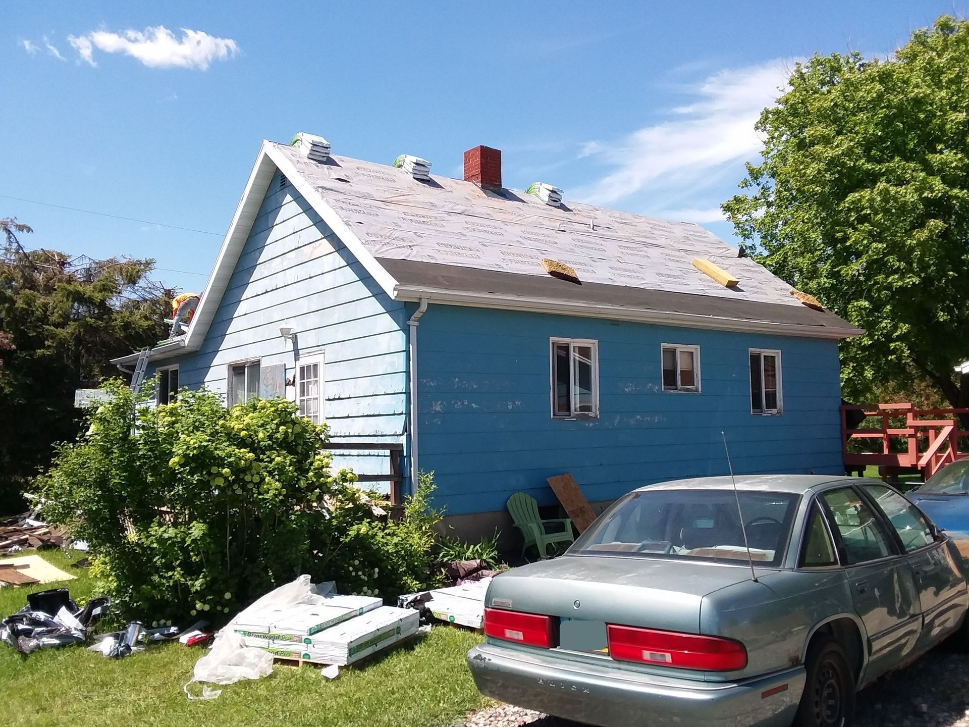 Old asphalt shingles removed, ice and water shield along with synthetic roofing felt installed on a home in Hawley, Minnesota