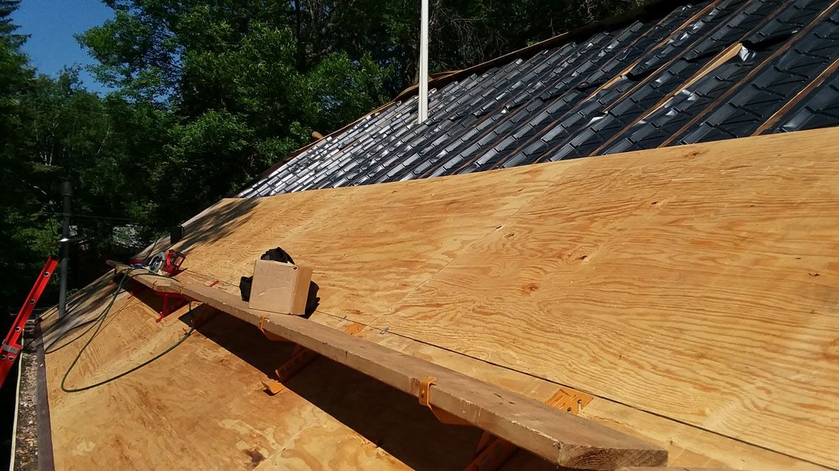 Plywood Installation on Roof Trusses using Roof Safety Jacks in East Grand Forks, MN