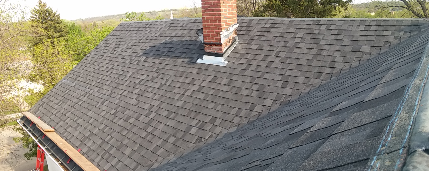 A near completed black asphalt shingle roofing project near Dunvilla Minnesota